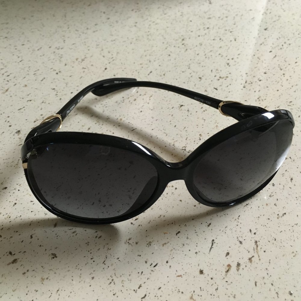 Shiseido sunglasses with gold accent